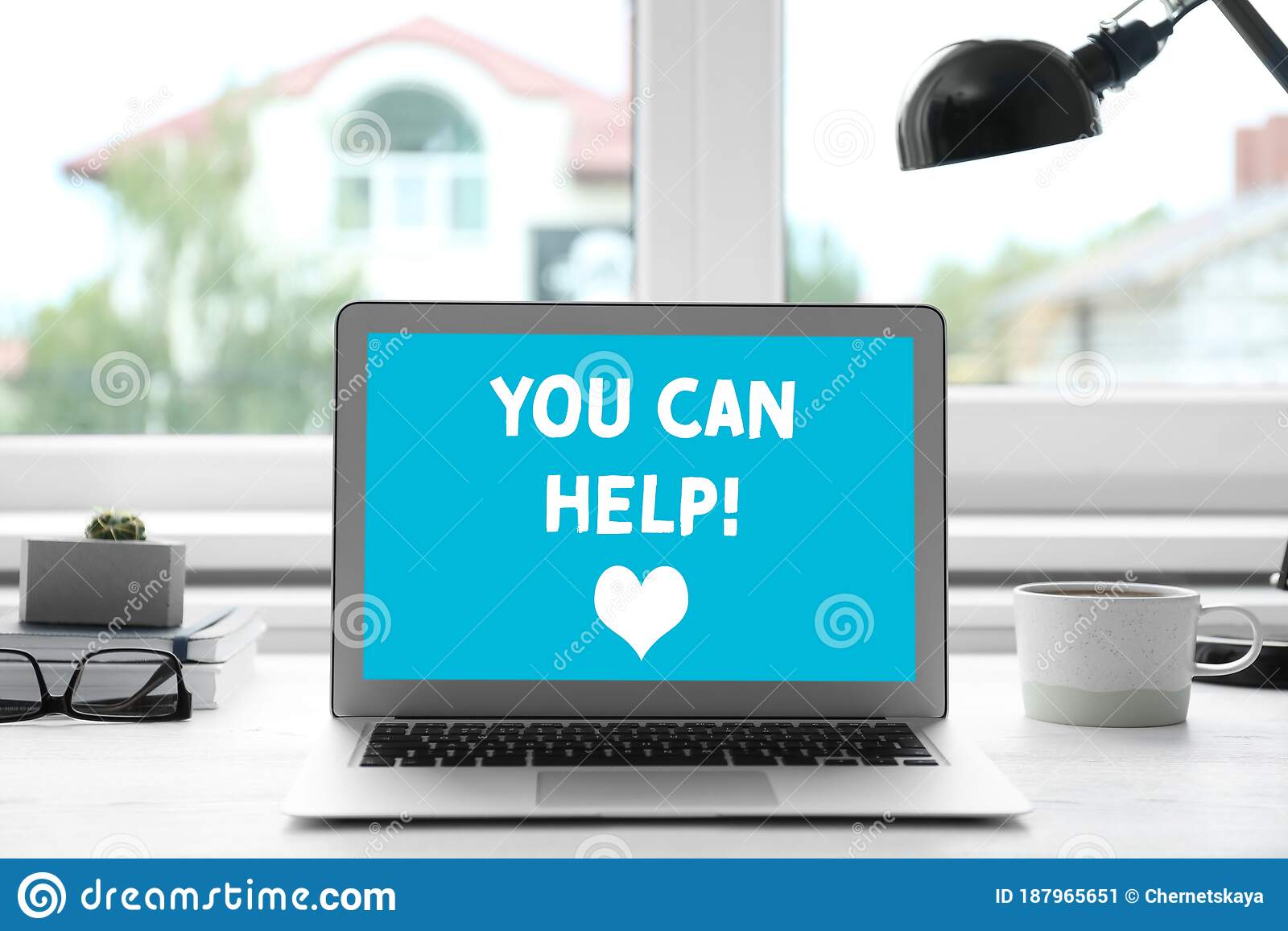 donations-concept-laptop-text-you-can-help-table-office-187965651.jpg